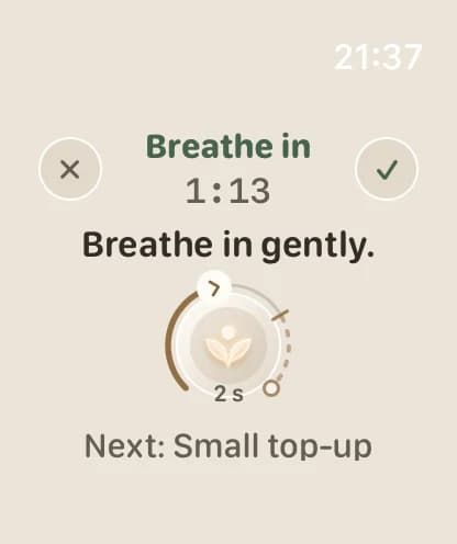 PAUSE on Apple Watch during a breathing pause: Breathe in, with the time remaining and a ring that follows the breath.